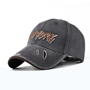 Close-up of vintage charcoal cotton baseball cap with 3D NEW YORK embroidery and distressed brim