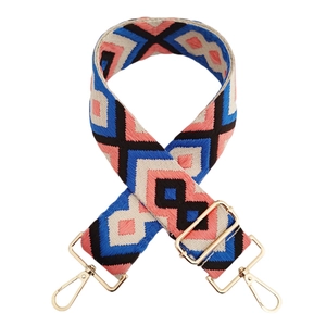 Detail of 5cm diamond jacquard woven strap with colorful geometric patterns and gold clips