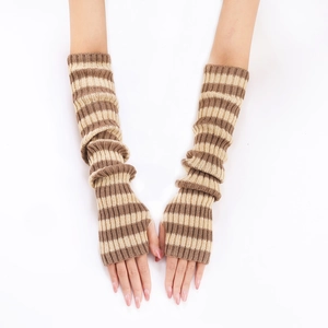 Detailed view of striped knit arm warmers in brown and beige with thumb hole design