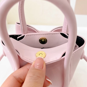 Pink bow crossbody bag in PU leather with magnetic closure for women and girls