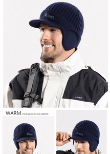 Detail of navy blue knit ear flap hat with Sport embroidery and fleece lining