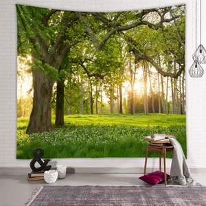 Detail showing forest landscape wall tapestry with lush green trees and soft sunset lighting