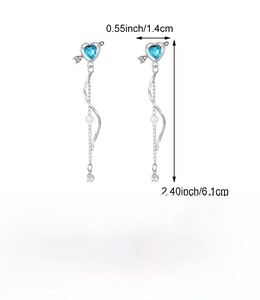 Detailed view of silver heart earrings with blue gems, pearls, and size dimensions