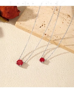 Macro shot of S925 sterling silver necklaces with octagon rose cut garnet pendants