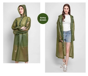 Detail of army green semi-transparent EVA raincoat with hood and white snap buttons