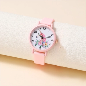 Pink silicone children's watch with unicorn dial design on white display stand