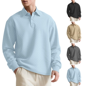 Men's long sleeve polo shirt with textured waffle pattern in light blue and grey tones