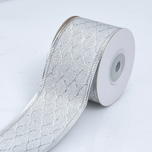 Close-up of silver diamond pattern ribbon with wired edges for Christmas decoration