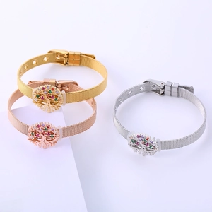 Three Tree of Life mesh band bracelets in gold, silver, and rose gold with colorful zircons