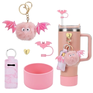 Pink bat theme accessory set for Stanley tumblers including silicone boot and charms