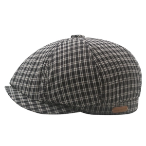 British style black and white plaid newsboy cap with vintage brown leather patch