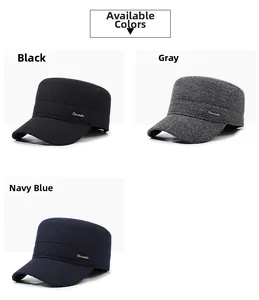 Close-up of winter flat top caps in black, grey, and navy with metal logo detail