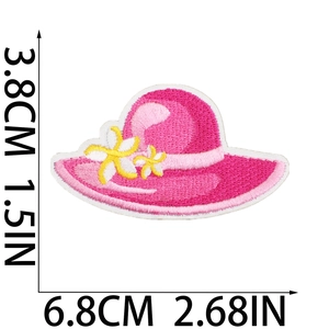 Detailed pink sun hat embroidery patch featuring floral accents and precise stitching