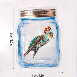 Rainbow suncatcher prism sticker featuring a colorful sea turtle inside a glass bottle design