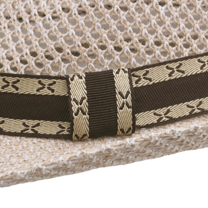 Detail of hollow knit sun hat featuring a brown ribbon with embroidered X patterns