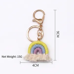 Detailed view of handmade woven rainbow keychain with size dimensions 9cm by 4cm
