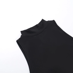 Close-up of high mock neck and stitching on a black sleeveless knit dress for women