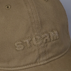 Brown cotton baseball cap featuring STORM embroidery with distressed vintage details