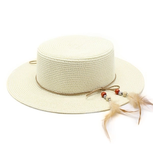 Straw boater hat with flat top, decorative beads and feather accents for outdoor travel