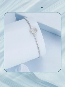 Macro detail of S925 sterling silver rose bracelet with micro-pave cubic zirconia accents