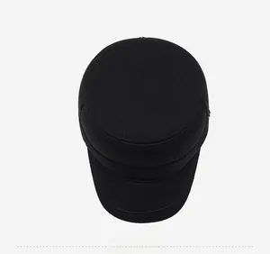 Top-down macro view of black wool cadet cap showing high-quality twill texture and stitching