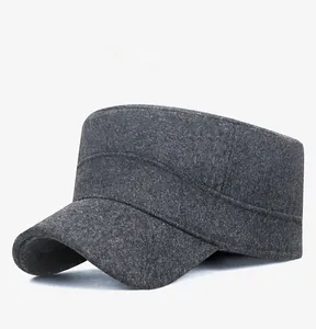 Detail view of dark grey wool felt cadet hat showing thick fabric texture and curved brim