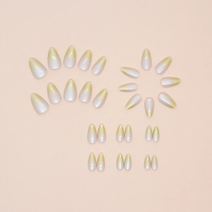 Short almond press-on nails with yellow to white gradient pearl finish 30pcs set