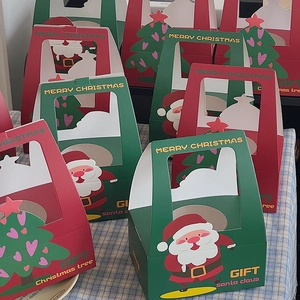 Christmas gift boxes with handles featuring Santa and tree patterns in red and green colors