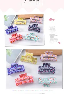 Detailed view of floral rectangular hair claws in six vibrant colors with metal springs