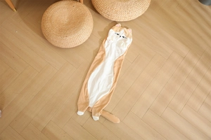 Macro detail of cute cat long plush pillow showing soft texture and facial embroidery