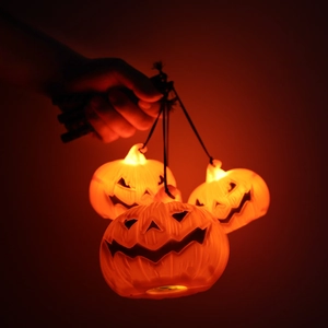 Glowing portable Halloween pumpkin lanterns with LED lights for festive decor