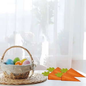 Carrot shaped Easter candy box in bright orange and green colors for party favors