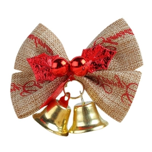 Linen Christmas bow with red berries and golden bells for holiday gift decoration