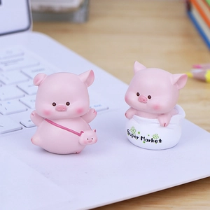 Set of two cute pink cartoon pig figurines for car dashboard and desk decoration