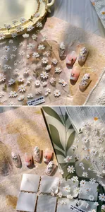 Macro shot of 3D embossed daisy nail stickers TS-4060 with floral relief details