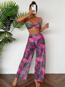 Three-piece bikini set with sheer mesh wide-leg pants and tropical leaf print pattern
