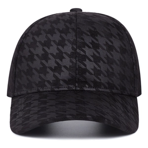 Classic black houndstooth pattern baseball cap with a textured six-panel structure