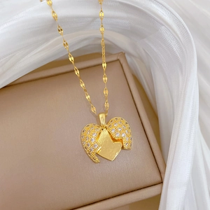 Double-layered gold titanium steel necklace with heart-shaped sparkling crystal pendant