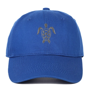 Detailed close-up of grey sea turtle embroidery on a navy blue cotton baseball cap