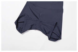 Detail of four-needle six-thread stitching on high-waist recycled yoga shorts