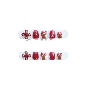 Handmade red and white press-on nails with 3D Chinese knot and plum blossom designs