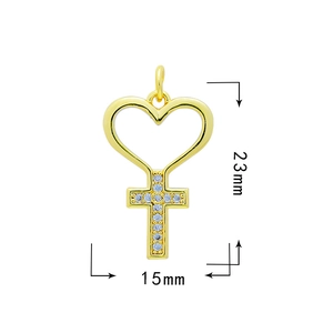 Macro view of gold heart cross pendant with blue zircon stones and size measurements