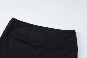 Detailed macro view of the high-elastic waistband and durable double-stitched black fabric