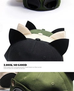 Detailed views of cotton baseball caps with cat ears and built-in goggles decoration