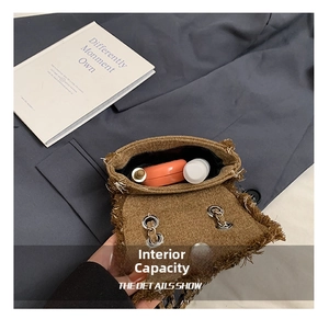 Internal view of a brown distressed mini crossbody bag showing storage for daily essentials