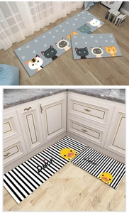 Kitchen mat set showing cartoon cat and duck patterns with anti-slip texture details