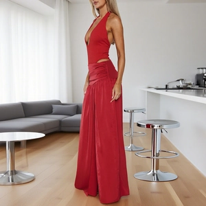 Sexy red halter neck top and high-waisted wide-leg trousers set in satin finish