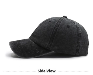 Side view of a vintage washed denim baseball cap in dark grey with a curved brim