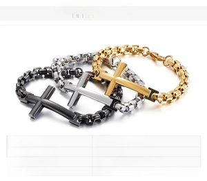 Detailed macro view of 316L stainless steel cross bracelets in gold silver and black