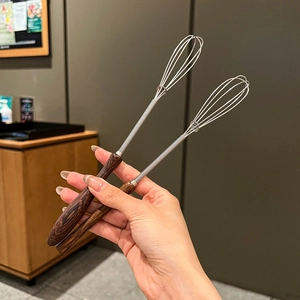 Japanese style manual egg whisk with wooden handle and stainless steel coil mixer
